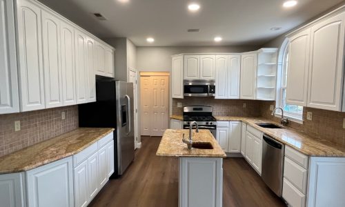 Raised-Panel Kitchen Cabinet Repainting