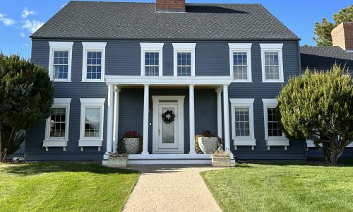 Gray Siding with White Trim Exterior Repaint