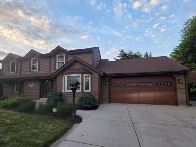 Home exterior with stained cedar siding