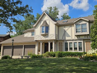 Beige exterior painting services in Oak Brook by CertaPro Painters of La Grange.