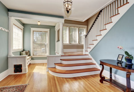 Stained Flooring & Blue Walls Foyer