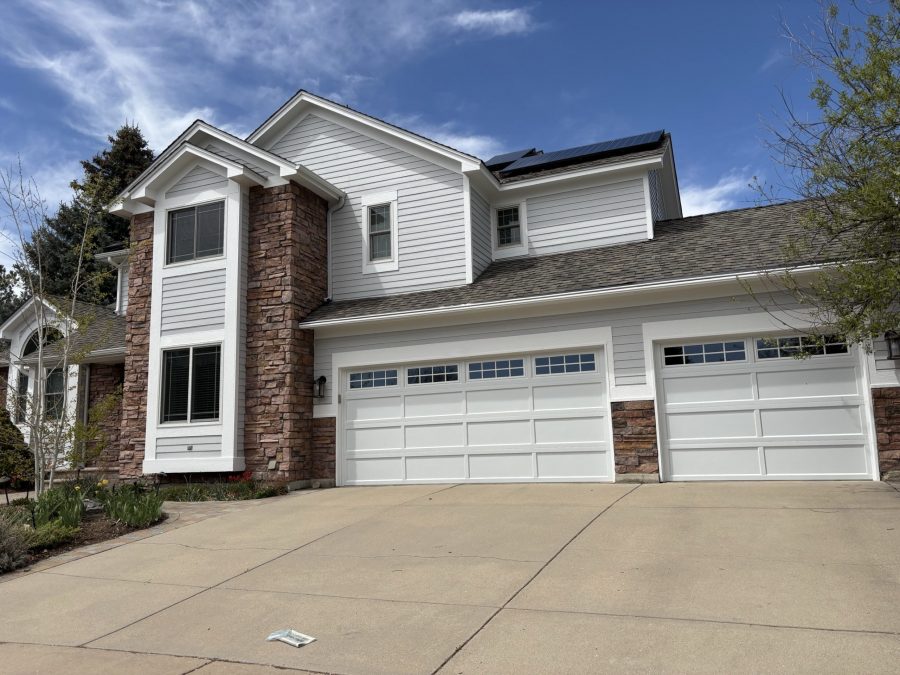 front exterior of house with stone and painted siding | garage view Preview Image 6