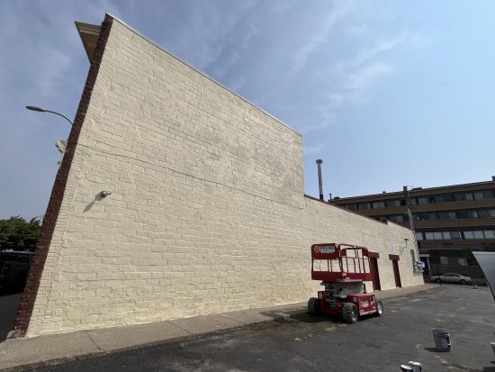 repainted white brick wall