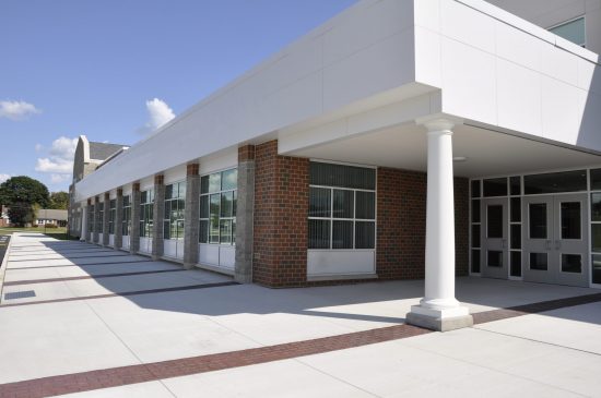 Schools and campuses exterior brick painting and pillars with environment protective paint with CertaPro Painters of Winston-Salem