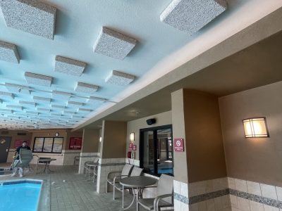 pool area with repaired and painted ceiling