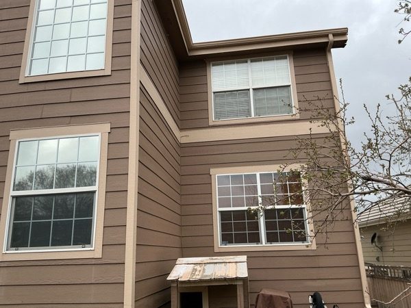 front corner of house with brown siding Preview Image 5