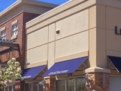 repaired stucco on shopping mall exterior