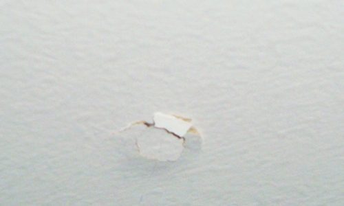 hole in wall from damage