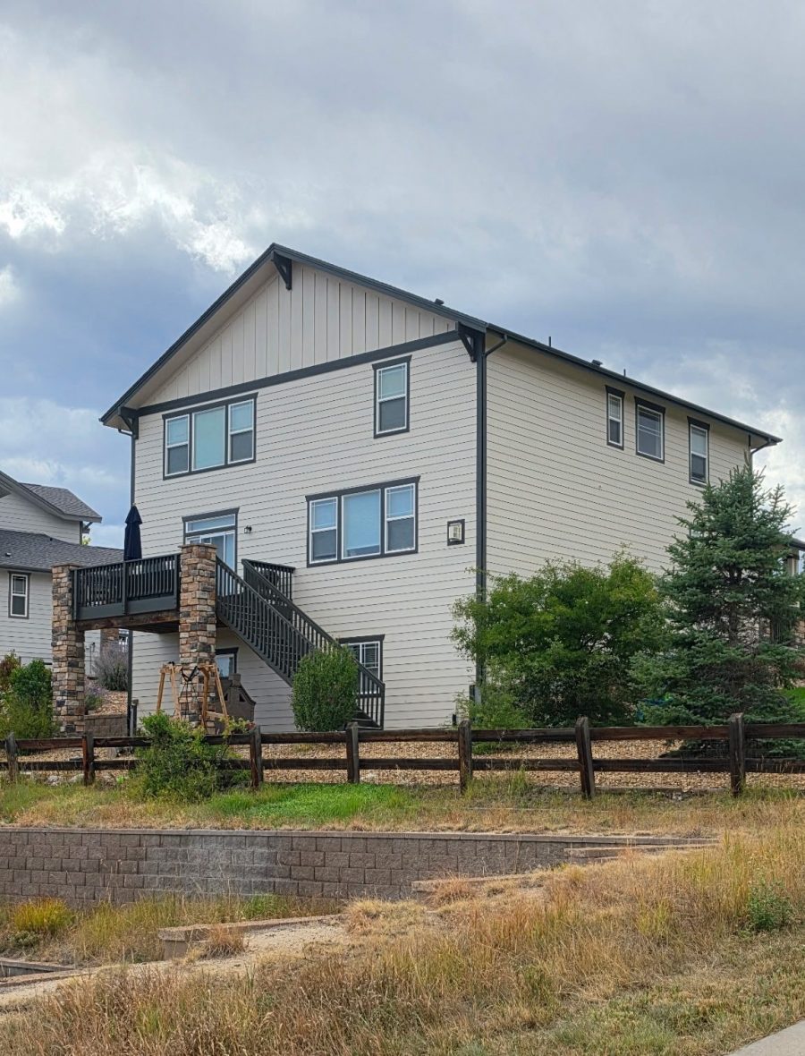 Before exterior color change showing the rear exterior, deck, and stairs of a Castle Rock home Preview Image 3