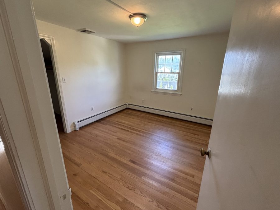 interior room in house with wooden floors and dirty and worn paint on walls Preview Image 15
