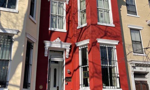 Dramatic Red Row Home
