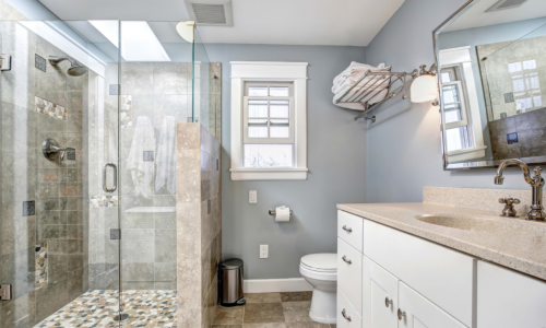 beautiful bathroom with freshly painted cabinets