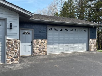 front of painted ranch style home