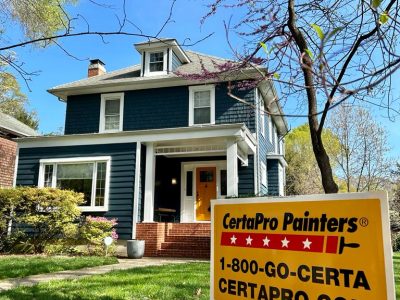 blue home exterior after painting with certapro sign