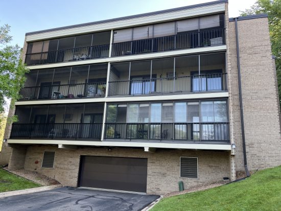 front view of balconies and patios above garage at green circle drive condos after exterior painting