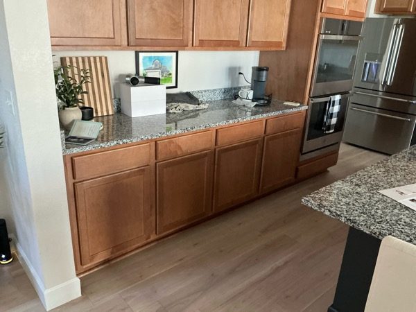 kitchen interior with stained wood cabinets and drawers Preview Image 6