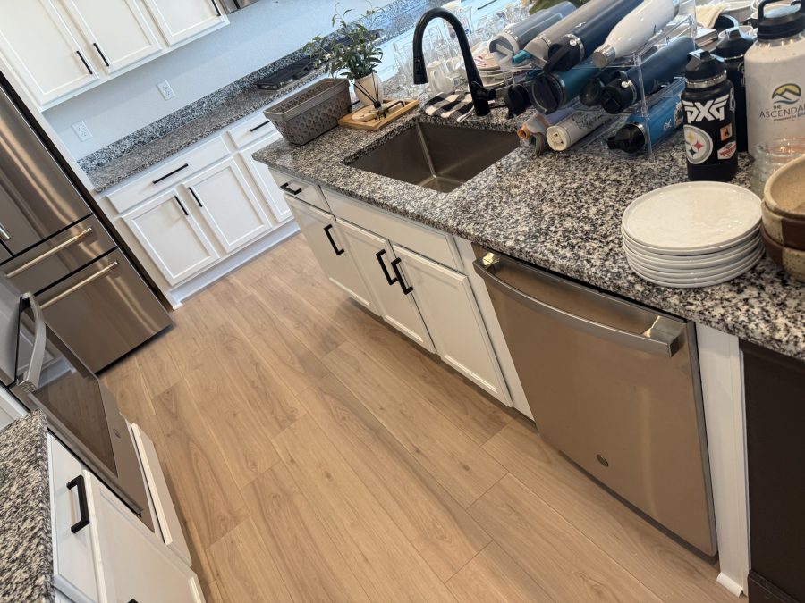 white painted kitchen cabinets with black hardware after repaint Preview Image 3