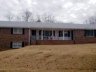 certapro painters of roswell repainted this brick home and barn in alpharetta