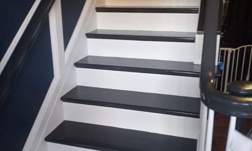 Wainscot Wall Paneling & High-Contrast Staircase Painting