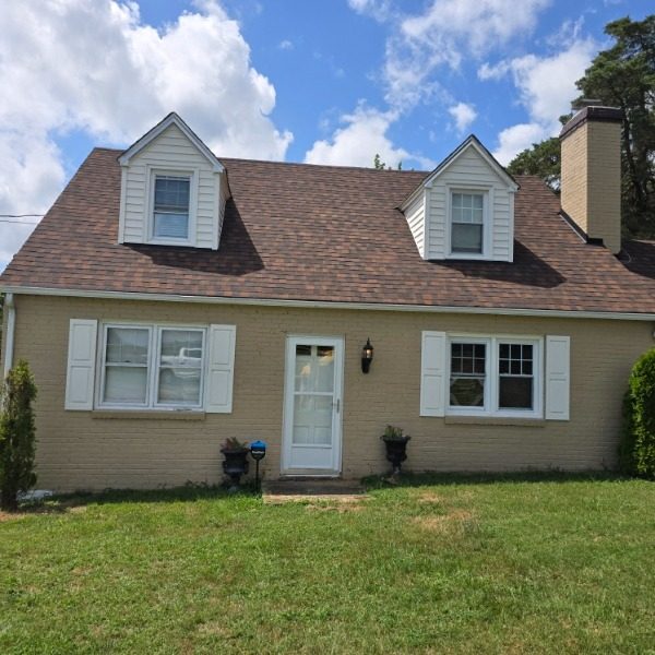 tan painted brick house before repaint Preview Image 1
