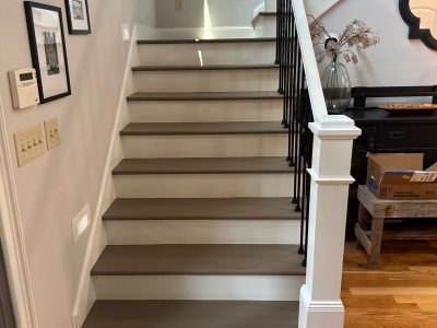 REPAINTED KITCHEN CABINETS, ENTERTAINMENT CENTER, WET BAR AND STAIRWELL