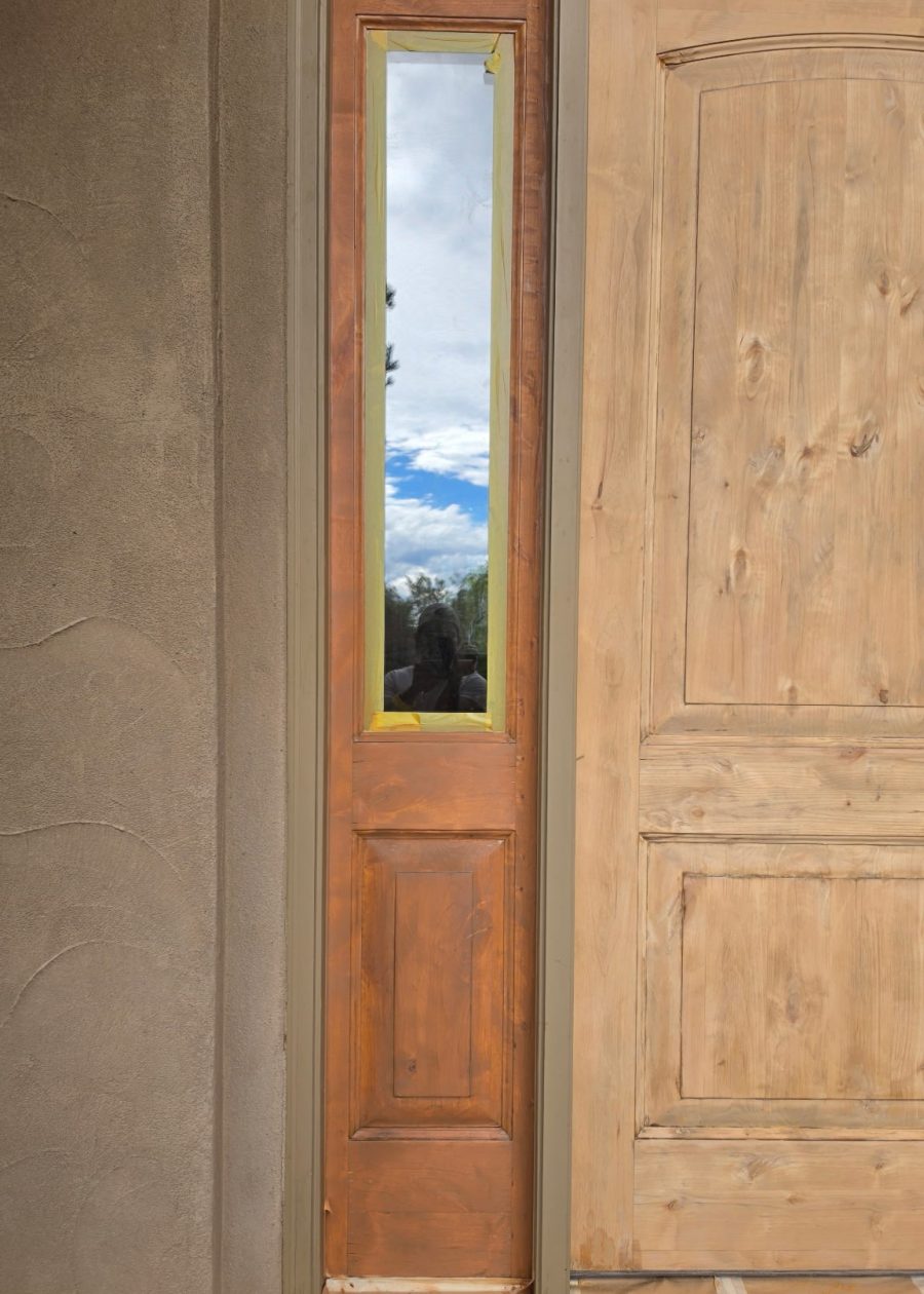 wooden home entryway door during stain Preview Image 7