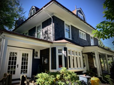 navy blue painted brick house