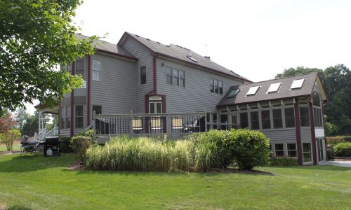 Full Exterior Siding, Sunroom Trim, and Architectural Gutter Repaint