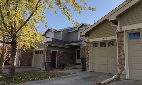 Side View of Townhome With New Paint