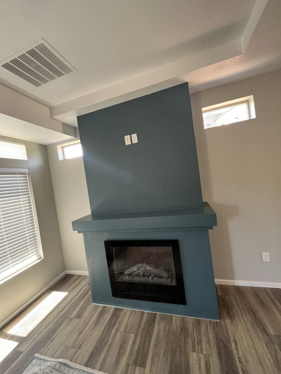 blue painted mantle in home Preview Image 1