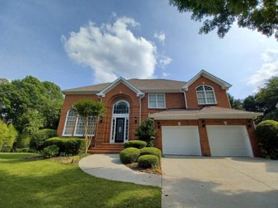 photo of repainted brick home in roswell georgia