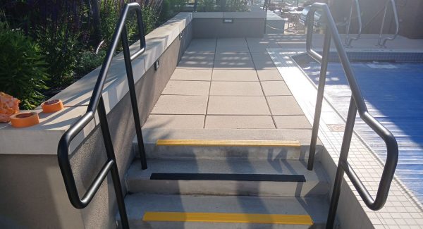 concrete steps with anti-slip and safety paint strips
