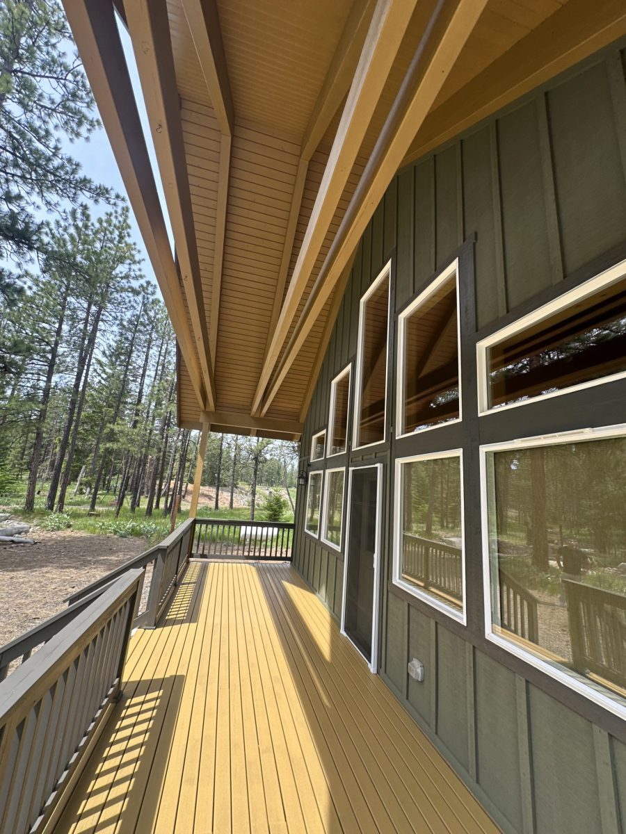 dark green stained cabin home exterior Preview Image 2