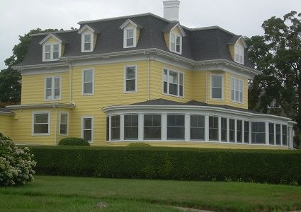 Classic Yellow Home with White Trim in Groton, CT