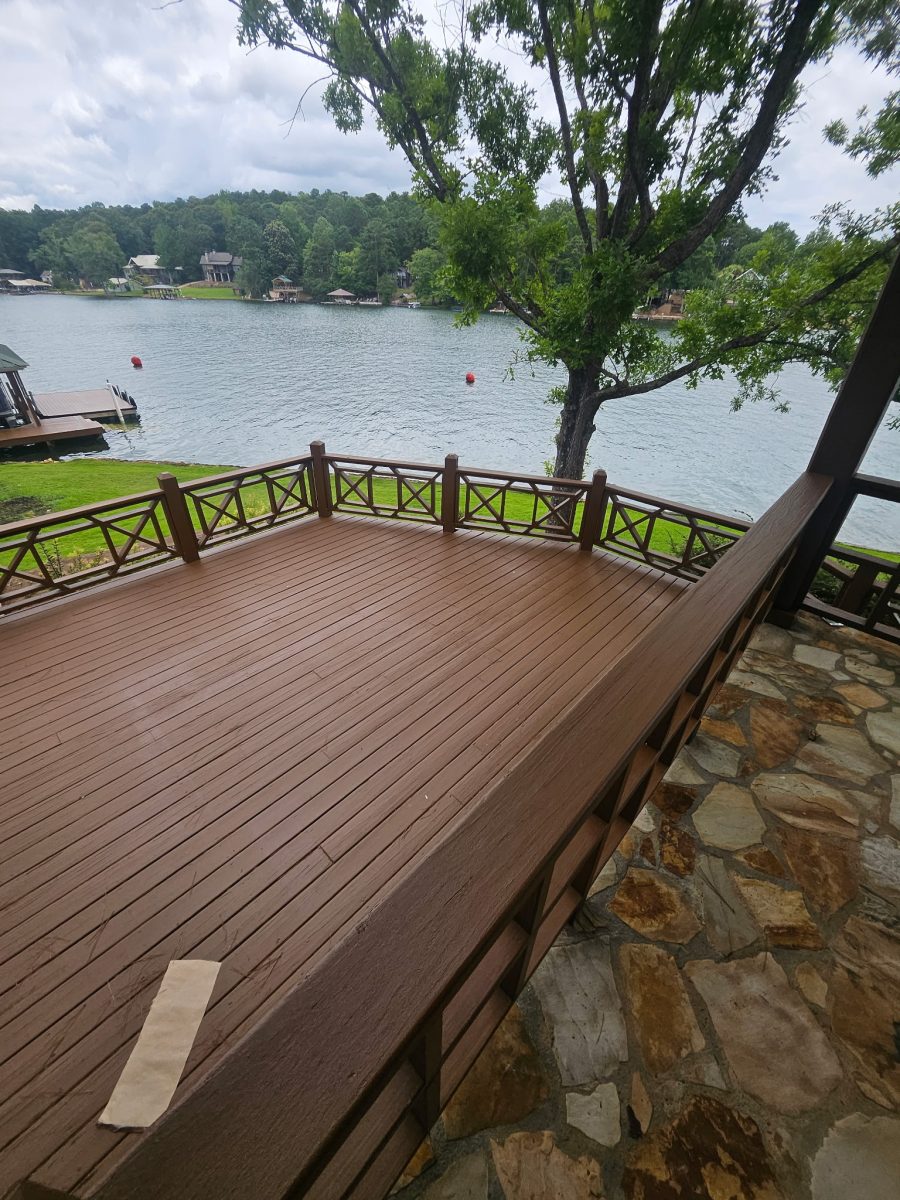 lower level of painted wooden deck next to lake Preview Image 1
