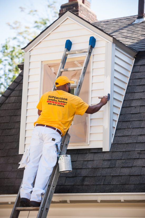 Exterior residential painting in the Hinsdale community.