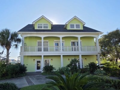 yellow painted home exterior