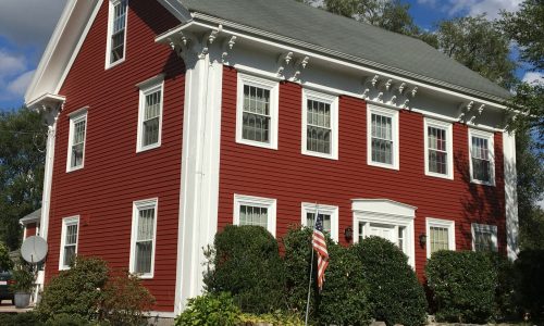 Historic Clapboard Painting, Pilaster Detailing, and Eave Bracket Finishing