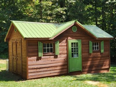 Painted and power washed outdoor shed, viewed from the front