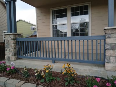 blue painted porch railing
