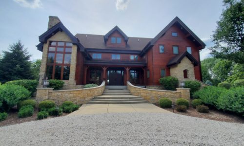 Exterior Wood Siding Refinishing and Chocolate Brown Eave Painting