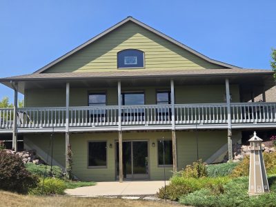Cato Wisconsin home exterior after solid stain on fiber-cement siding