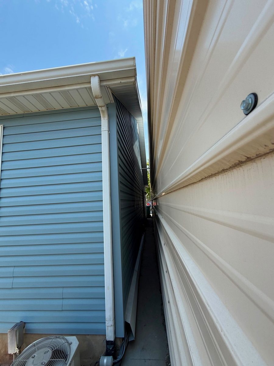 House exterior with painted blue siding and white trim Preview Image 3