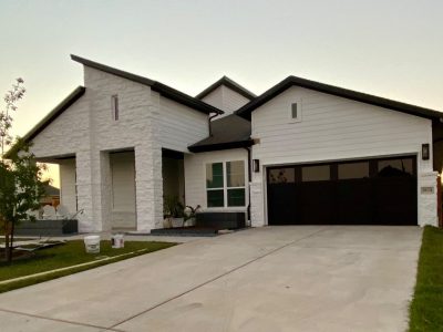white painted house exterior with black details