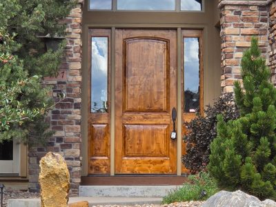 wooden home entryway door after stain