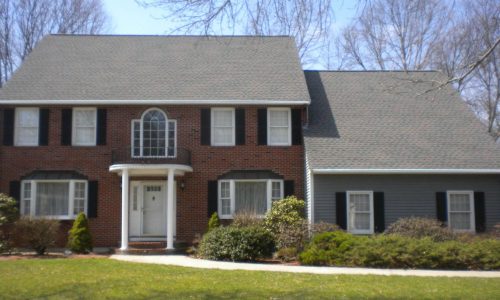 Colonial Clapboard Siding Repaint, Shutters, and Portico Detailing