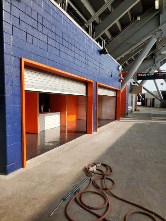 Painting Denver Empower Field at Mile High