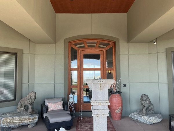 covered entryway and front door of house Preview Image 9