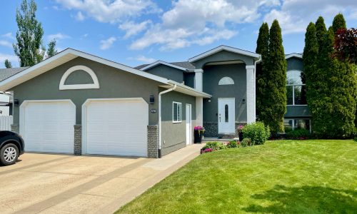 Full Exterior Stucco Coating, Arched Trim, and Garage Door Painting