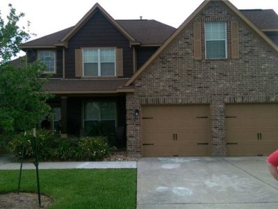 Exterior trim and garage door painting.